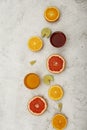 Creative layout made of fruits. Flat lay.  Fresh juice orange, grapefruit, lemon, lime, on a white background. Royalty Free Stock Photo