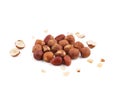 Creative layout made of hazelnut nuts on white background.