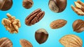 Creative layout made pattern nut mix isolated Flat lay blue background with clipping path. Macro concept. Full depth of field.