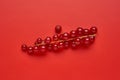 Red currant on red background Royalty Free Stock Photo