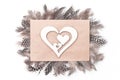 Creative hearts envelope with monochrome feathers, flat lay Royalty Free Stock Photo