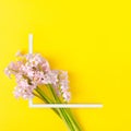 Creative layout with pink hyacinth on illuminating yellow background. Minimal spring Royalty Free Stock Photo