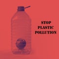 Creative layout for World Environment Day - Stop Plastic Pollution. The globe as symbol of earth inside big plastic bottle. Royalty Free Stock Photo