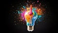 Creative light bulb explodes with colorful paint and splashes Royalty Free Stock Photo