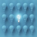 Creative light bulb Idea concept on blue background. Royalty Free Stock Photo