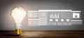 Creative light bulb symbolizing innovation and artificial intelligence, with data analytics visuals and digital elements Royalty Free Stock Photo