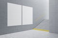 Creative light concrete tile interior with stairs and mock up poster on wall. School hallway and corridor concept. Royalty Free Stock Photo