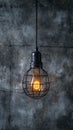 Creative lighting hanging lightbulb on industrial cement background Royalty Free Stock Photo
