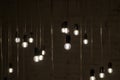 Creative lighting, light bulbs in the air. Selective focus. Royalty Free Stock Photo