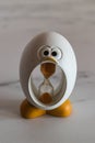 Creative made of egg hourglass, looking like a little chick Royalty Free Stock Photo