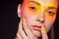 Creative make-up of colored powder closeup. Colored nail design. Studio Royalty Free Stock Photo