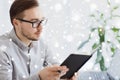 Creative male worker with book at home office Royalty Free Stock Photo