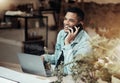 Creative man, phone call and laptop laughing at cafe for communication, social network or funny conversation. Happy male Royalty Free Stock Photo