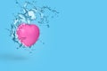 Creative minimal scene made of pink heart and and water splash Royalty Free Stock Photo