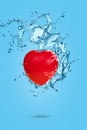 Creative minimal scene made of red heart and and water splash Royalty Free Stock Photo