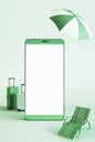 Creative mobile phone with travel items. Online trip booking concept on green background. Mock up place on screen.