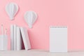 Creative mock up back to school - white stationery, blank letterhead and hot air balloons origami on soft pink backdrop.