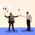 Creative modern design. Businessman giving another man lightbulb symbolizing share of ideas and knowledges