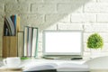 Creative modern desk with white laptop Royalty Free Stock Photo