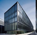 creative modern glass office building of a large corporation in the city, environmental building design with proportional