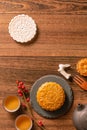 Creative Moon cake Mooncake table design - Chinese traditional pastry with tea cups on wooden background, Mid-Autumn Festival