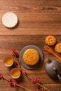 Creative Moon cake Mooncake table design - Chinese traditional pastry with tea cups on wooden background, Mid-Autumn Festival