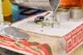 Creative occupation of candle making showing the pouring of liquid wax into jars Royalty Free Stock Photo