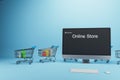 Creative online shopping concept with trolleys and computer monitor on blue background. Shop online and digital media concept. 3D