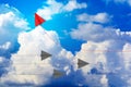 Creative paper planes on a cloud background. Leadership and success concept.