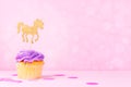 Creative pastel fantasy holiday card with cupcake, confetti and