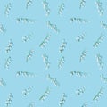 Creative pattern with spring flowers white lilies of the valley on blue. Seasonal floral design.