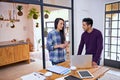 Creative people, laptop and discussion with team in planning or meeting for project together at the office. Happy man Royalty Free Stock Photo