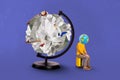 Creative photo 3d collage artwork postcard poster of unhappy upset person sitting suitcase near paper globe on