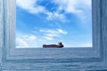 Creative picture bending seascape with ship. Curved space