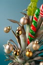 Creative pineapple with Christmas decorations on studio background