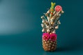 Creative pineapple with Christmas decorations on studio background