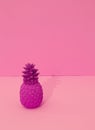 Creative pineapple on vanilla pink background. Minimal. Still life. Copy space