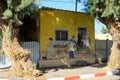 Creative placemaking. Artists paint pictures on the walls of old houses