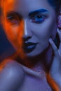 Creative portrait of cutie adult woman with mixed lights