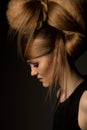 Creative portrait of a model girl with a high fashion hairstyle and makeup on the background. Hair extensions are a hairdressing Royalty Free Stock Photo
