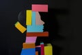A creative portrait of a womans face constructed using colorful blocks, showcasing artistic and imaginative design