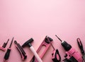 Creative provocation: a flat layout of pink hand tools on a pink background.