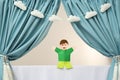 Creative puppet show on white stage indoors Royalty Free Stock Photo