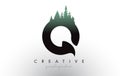 Creative Q Letter Logo Idea With Pine Forest Trees. Letter Q Design With Pine Tree on Top Royalty Free Stock Photo