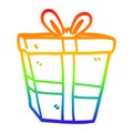 A creative rainbow gradient line drawing cartoon gift wrapped present Royalty Free Stock Photo