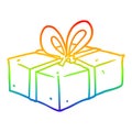 A creative rainbow gradient line drawing wrapped gift Royalty Free Stock Photo