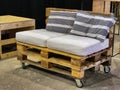 Creative re-use of storage and delivery woodden pallets for handcrafted sofa Royalty Free Stock Photo