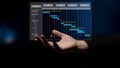 Detailed Project Management Gantt Chart Visualization on a Hand with Dark Background Representing Planning and Execution Royalty Free Stock Photo