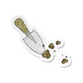 A creative retro distressed sticker of a cartoon garden trowel Royalty Free Stock Photo