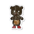A creative retro distressed sticker of a cartoon happy teddy bear in boots Royalty Free Stock Photo